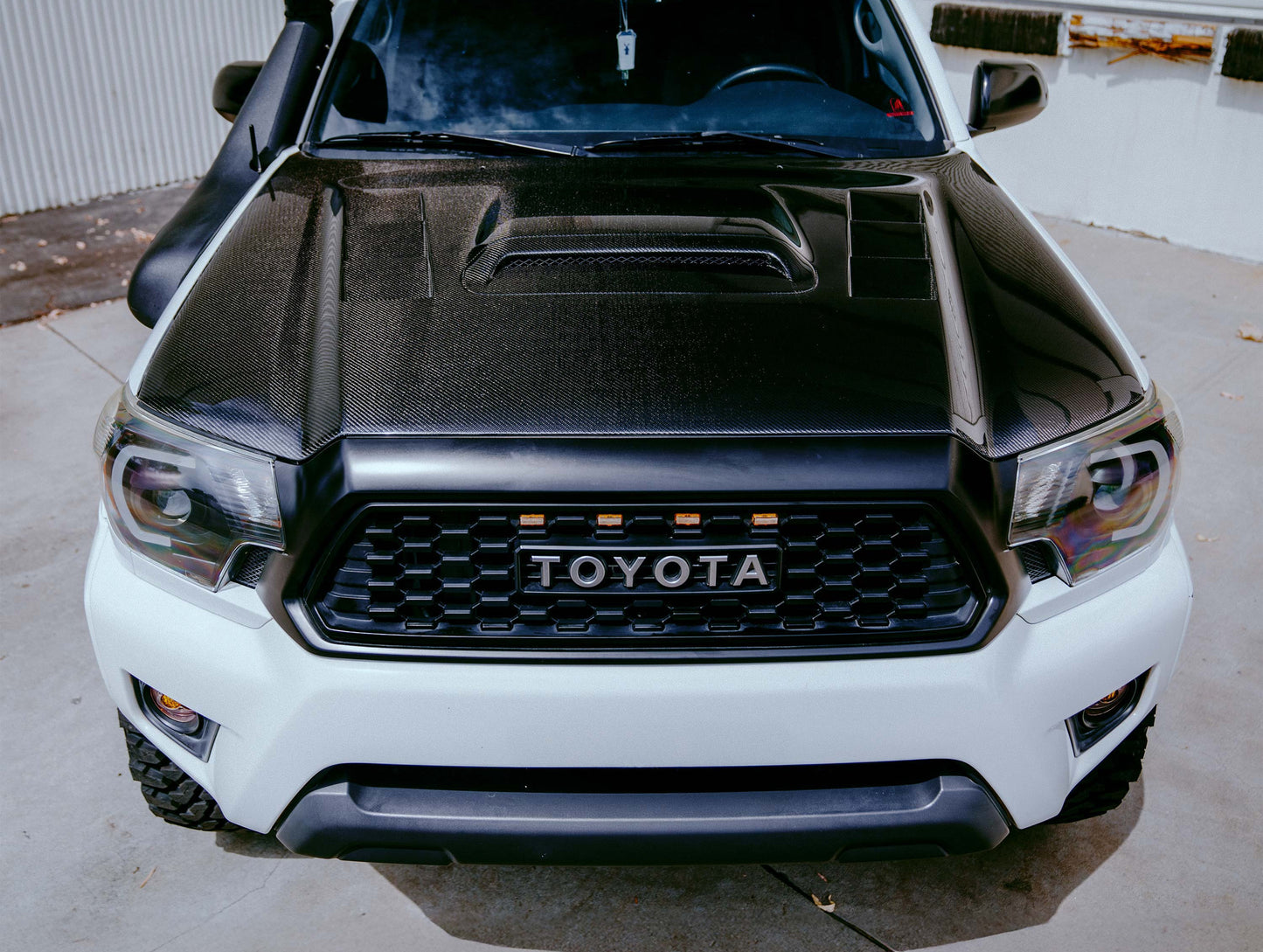 Seibon TS-Style Carbon Fiber Hood - 12-15 Toyota Tacoma